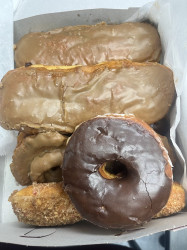 Fosters Donuts "Made & Served By People Who Care"